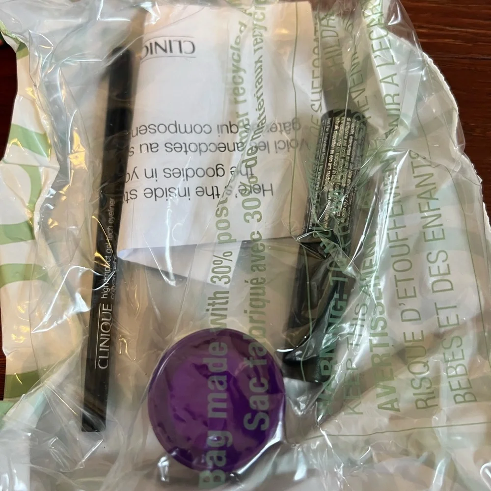 New in package!  Clinique Eye Makeup Kit with Floral Cosmetic Bag